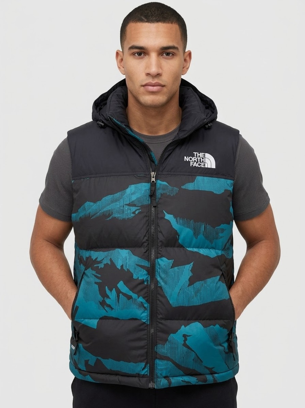 The North Face men Hooded Puffer Vest in Teal and Black